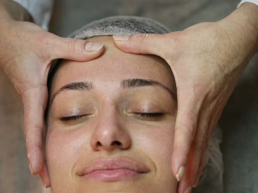 Beauty therapist preparing a treatment room